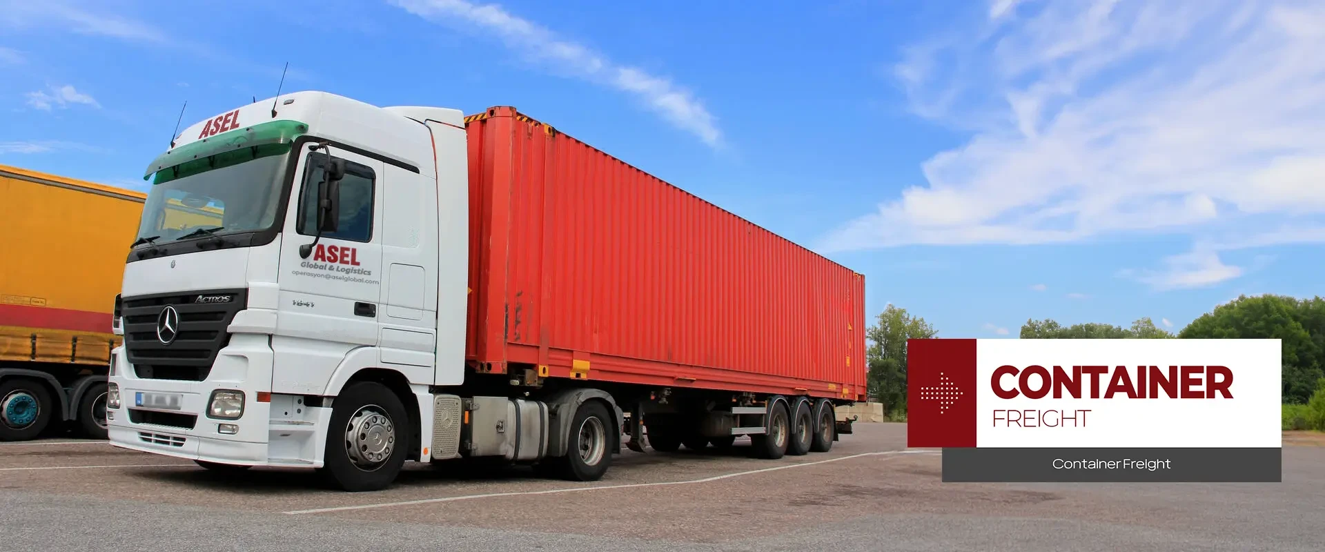 A large truck with a red trailer, featuring a picture that says Container Transportation